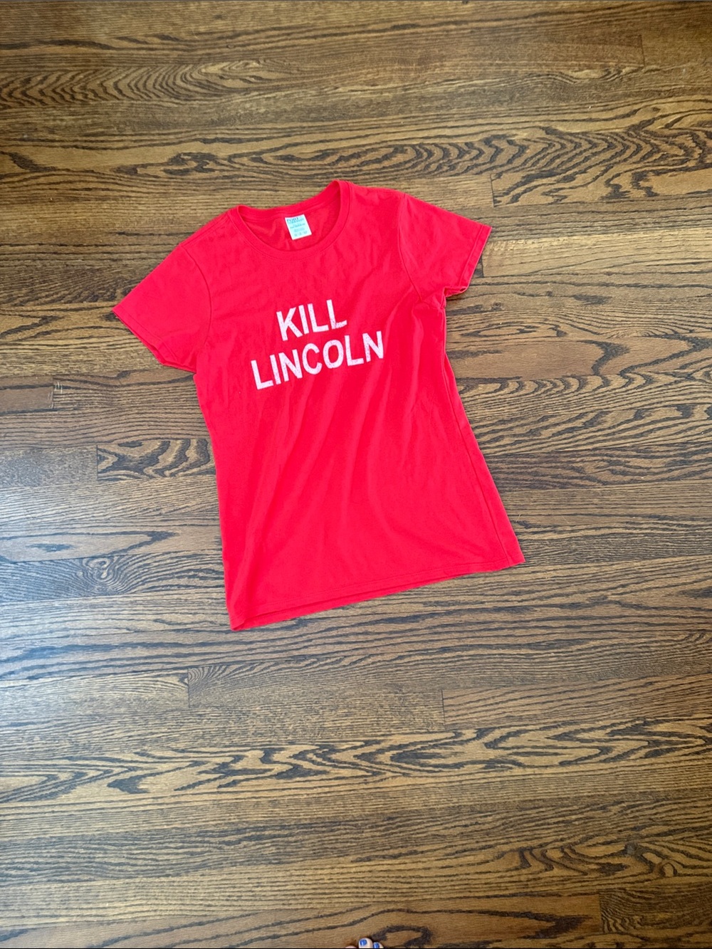 Port and Company Red Tee with White "Kill Lincoln" Graphic